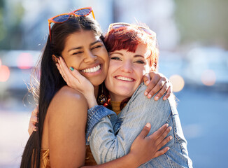 Portrait, hugging and girl friends in city for love, reunion and connection in street together....