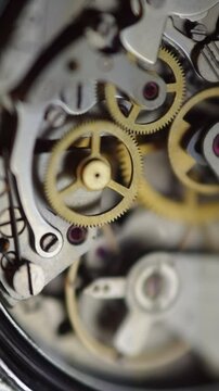 Cogwheels inside clockwork. Close-up. Concept Eternity, Teamwork , Idea Technology. Tick-Tick Sound