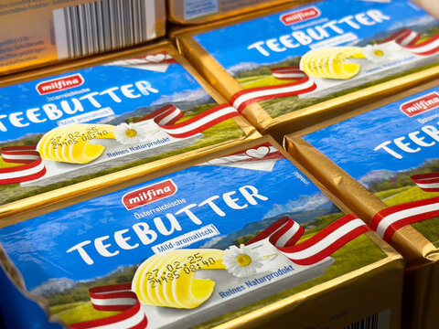 Austrian teebutter packaging with alpine imagery and chamomile decor