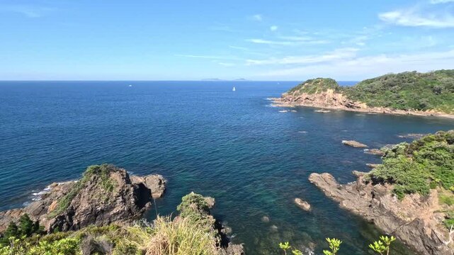 Matapouri Bay New Zealand Pan Right To Ocean View With Boat In Distance