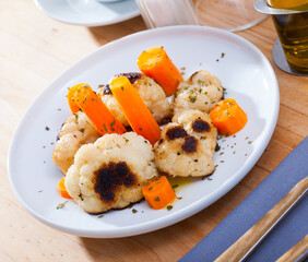 Appetizing cauliflower with carrots. High quality photo