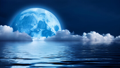 this massive complete blue moon rises brightly over the cloud bank in this calm ocean