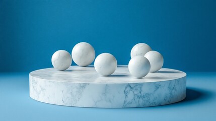White marble pedestal with spheres on a blue background