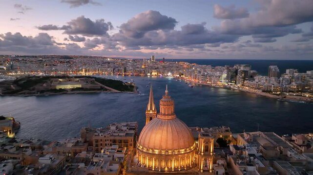 4k Aerial shot of Valletta old town in Malta during sunset. Flying over Valletta city, Malta