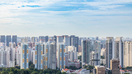Modern developing residential district with tall skyscrapers and green park in the foreground, Singapore