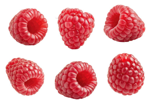 Six fresh, red raspberries isolated on transparent background