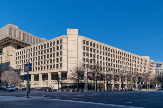 The J. Edgar Hoover FBI Building in Washington, D.C., was photographed on a clear day. Its brutalist architecture symbolizes federal law enforcement, governance, and national security.