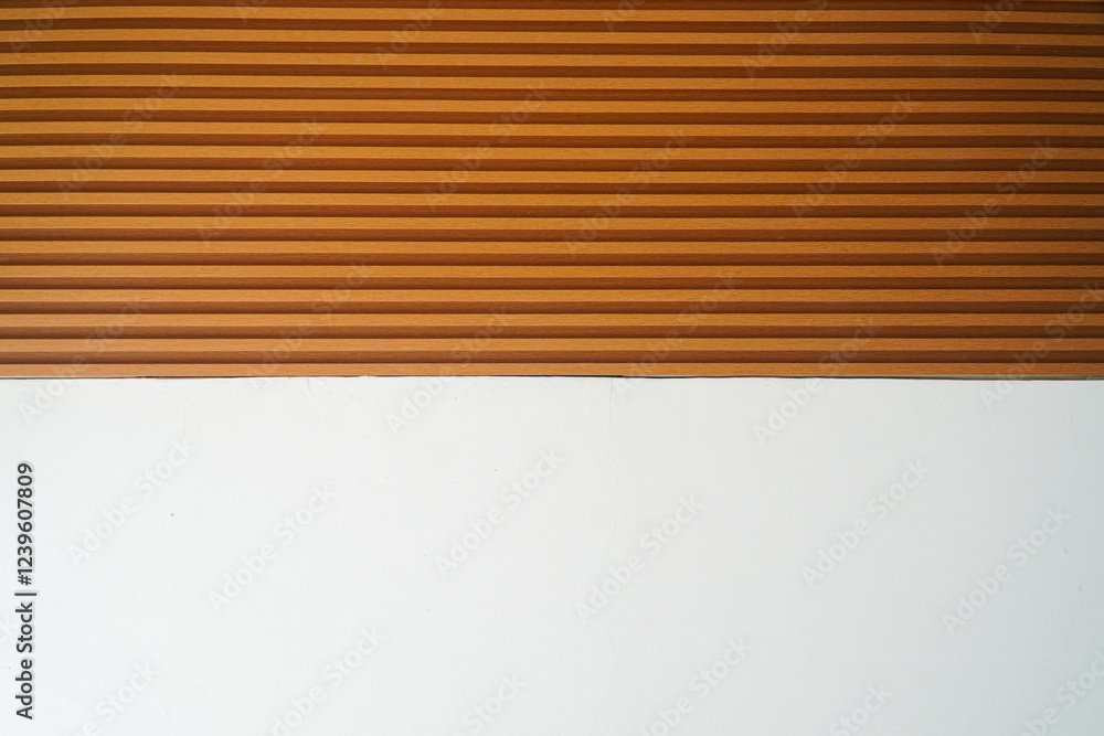 Poster an image showcasing a minimalist design with a horizontal orange wood texture contrasted against a c