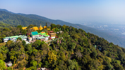 Wat Phra That Doi Suthep Temple shining on the mountainside in Chiang Mai, Thailand