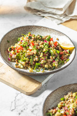 Buckwheat tabbouleh salad. Traditional middle eastern or arab dish. Levantine vegetarian salad.