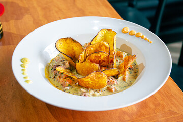 PERUVIAN CEVICHE SEBICHE. Peruvian seafood and fish sebiche with maize and potato sweet crips