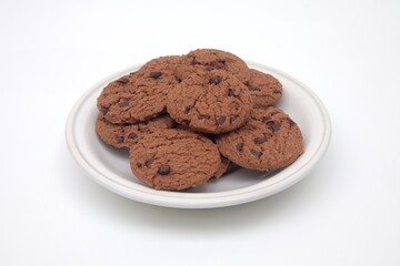 A pile of chocolate biscuits served on a white plate