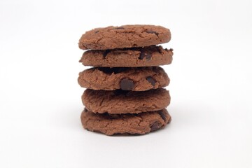 Stack of chocolate biscuits on a white background
