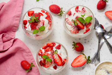 Coconut dessert with fresh strawberries in a glass .top veiw