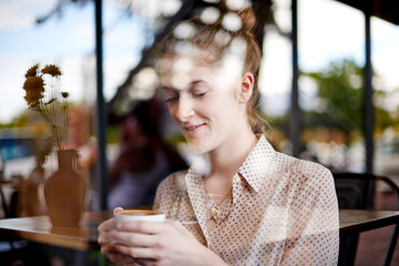 Coffee, thinking and woman by cafe window with smile in morning with creative digital nomad career....