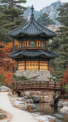 Scenic Korean Pagoda in Autumn Forest, Traditional Architecture with Wooden Bridge Over Tranquil Stream Amid Vibrant Foliage and Majestic Mountain View