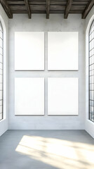 Fototapeta premium Four Blank Canvases Hang on a Gallery Wall with Large Windows and Wood Beam Ceiling