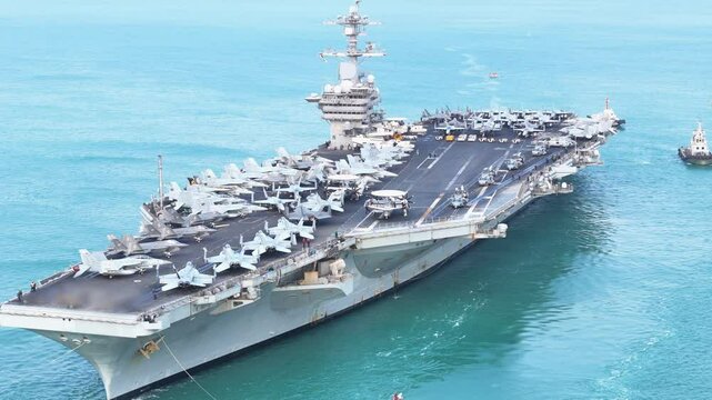 Nuclear war ship, Navy ship, Military navy. nuclear carrier running in the ocean. Military navy ship carrier full loading fighter jet aircraft for prepare troops