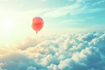 Fototapeta premium Red Balloon Floating Above Soft Clouds In Sky