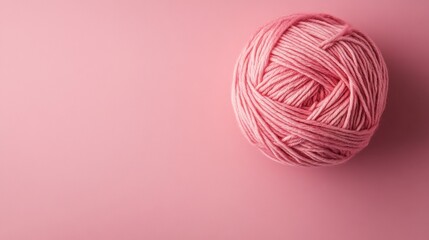 Delicate Pink Yarn Skein on Soft Pastel Background Ideal for Feminine Crafting Projects