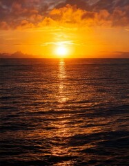 Naklejka premium sunset over a tranquil ocean 