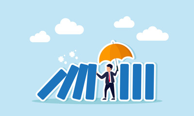 Businessman holds an umbrella to stop falling blocks from knocking down standing ones, illustration of maintaining team and financial stability in business performance