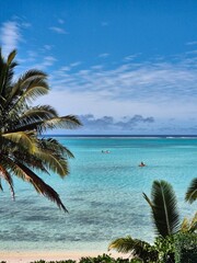 Tropical island beach, kayak, blue water, palm tree