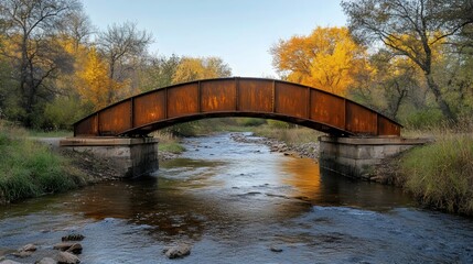 Naklejka premium A bridge spans a river with a view of the water below