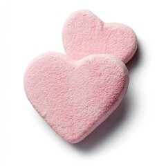 Fototapeta premium Two pink heart-shaped marshmallows on white background. (4)
