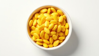 Bright yellow sunflower seeds in a shallow bowl on white background, food, bowl, oil