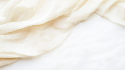 Soft white fabric with gentle folds and texture