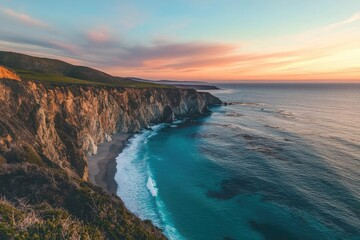 Fototapeta premium ethereal coastal vista with dramatic cliffs meeting turquoise waters at sunset