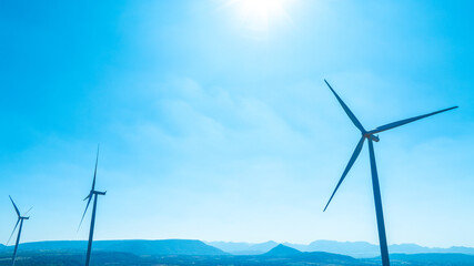 Wind farm on the mountain on blue sky day wind energy concept alternative energy Renewable energy	

