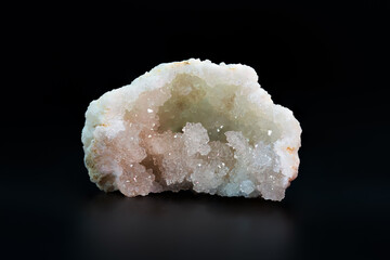 quartz geode on black background