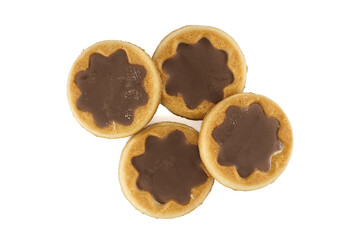 Four star-shaped chocolate cookies arranged on a white background. A sweet and delicious snack
