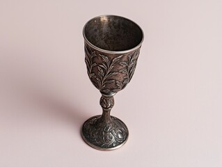 Antique silver goblet with ornate leaf design