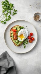 Avocado Toast with Poached Egg and Cherry Tomatoes: A Delicious and Healthy Breakfast.