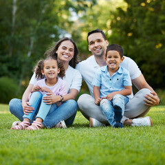 Parents, children and smile in portrait at park with bonding together, holiday break and support....