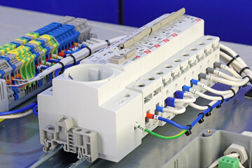 Circuit breakers to protect electrical loads in the electrical switchboard. Soft focus. Close-up. 