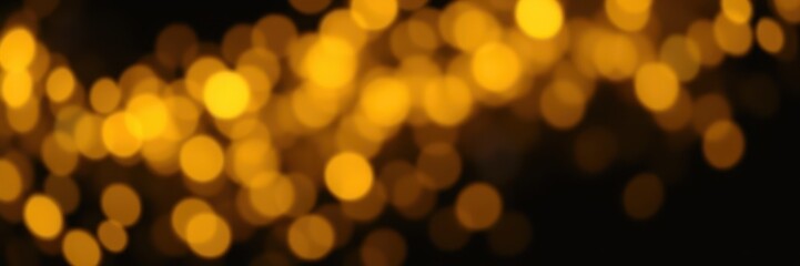 Golden bokeh lights create a magical atmosphere for celebrations and events during evening time