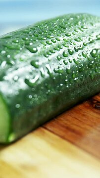 Sliced cucumber on chopping board