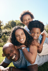 Black family, portrait and happy on grass for travel, summer vacation and relax in pile. Parents,...