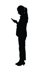 The silhouette of a woman standing using her phone emphasizes the connection women have with technology
