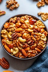 Fototapeta premium Honey Glazed Mixed Nuts In A Bowl
