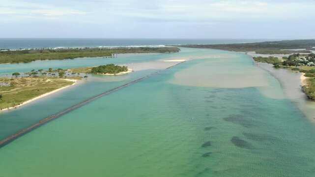 Bellinger River estuary, Mid North Coast region of New South Wales, Urunga in Australia. Aerial forward and title space