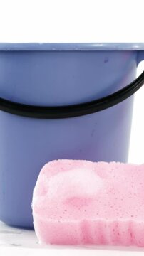 Cleaning sponge and plastic bucket