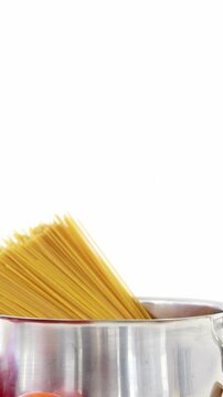 Raw spaghetti with cherry tomatoes and garlic