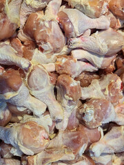 Raw chicken drumsticks selling in market