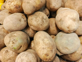 Close-up of a pile of russet potatoes