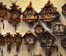 Fototapeta premium Beautiful handmade cuckoo clocks in vintage gift shop